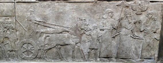 Wall frieze depicting a triumphal march. Assyrian, about 865-860 BC From Nimrud, Iraq.