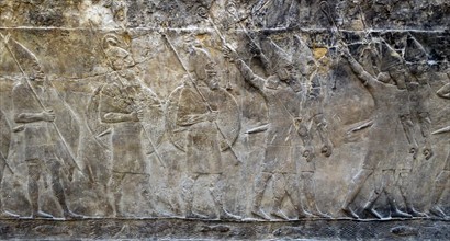 Wall frieze depicting Campaign against the town of -alammu. Assyrian, about 700-692 BC From Nineveh, Iraq.