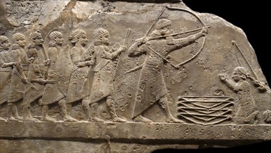 Relief showing Ashurbanipal rescues foreign princes from a 1ion. Assyrian, about 645-635 BC From Nineveh, Iraq.