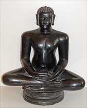 Stone statue depicting a seated Mahavira, from Karnataka, India