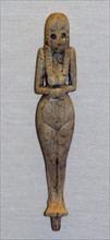 Ivory figure with hollow eyes and eyebrows from Ancient Egypt