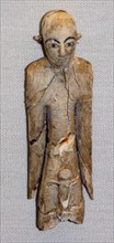 Ivory figure with hollow eyes and eyebrows from Ancient Egypt