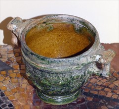 Glazed cup decorated with oak leaves and acorns