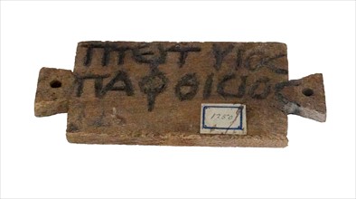 Egyptian wooden tag with Greek inscription