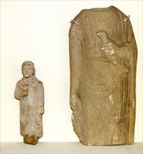 Limestone figurines of women