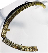 Silver gilt object with bands of animal decorations