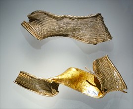 Pair of gold hilt collars from a sword