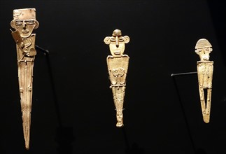 gold alloy, copper and silver votive figurines