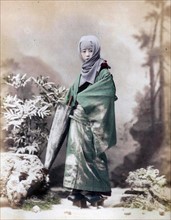 Japanese woman with umbrella, 1900