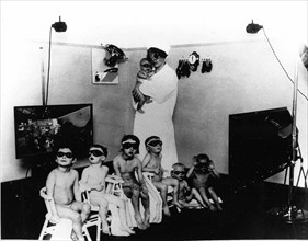 A Nazi nurse with “German super race” children