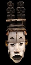 Okorosia masquerade mask made of painted wood