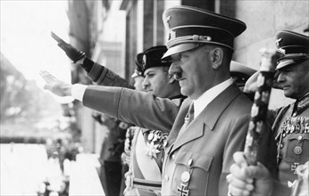 Photograph of Adolf Hitler and Count Ciano saluting on the chancellery balcony, Berlin
