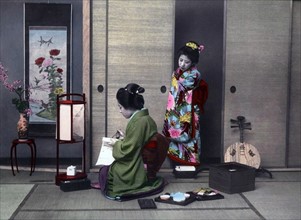 Hand-coloured photograph of Japanese women by Felice Beato