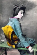 Hand-coloured photograph of Japanese woman by Felice Beato
