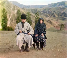 Colour photograph of a man and woman in Dagestan photographed by Sergey Mikhailovich Prokudin-Gorskii