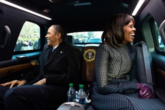Photograph of President Barack Obama and First Lady Michelle Obama riding in the Presidential limo