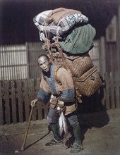 Hand-coloured photograph of Japanese man by Felice Beato
