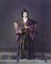 Hand-coloured photograph of a Japanese woman by Felice Beato