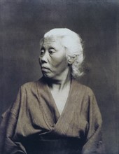 Hand-coloured photograph of Japanese woman by Felice Beato