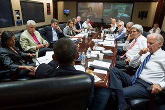 US president Obama has a video conference call in 2014 in the situation Room at the White House.