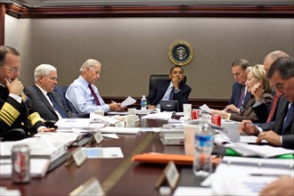 US president Obama has a meeting in 2011 in the situation Room at the White House.