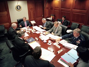 President George W Bush, meets with top security and government officials, in the White House situation Room