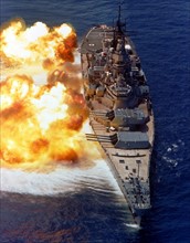 USS Iowa firing a full broadside during a gunnery demonstration, 15 Aug 1984
