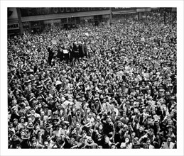 Crowd gathers in New York, USA, to celebrate the end of World war two, May 1945