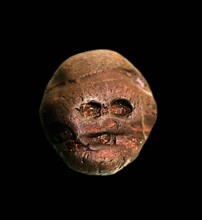 earliest recorded human made, artistic object. from Makapansgat, South Africa