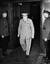 Photograph of British Prime Minister Winston Churchill exiting the conference room in Cecilienhof, Potsdam, Germany