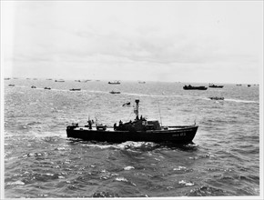 Photograph of the Coast Guard off Omaha Beach on the morning of D-Day