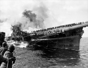 Aircraft carrier USS Franklin (CV-13) attacked during World War II, March 19, 1945.