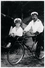 Tsarevich of Russia on a bycicle with the sailor Derevenko