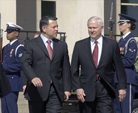Robert M. Gates, right, escorts King Abdullah ll of Jordan
