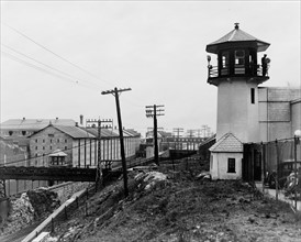 Photograph of Sing Sing Prison, showing guard tower and cell block