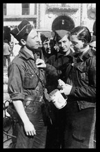 Photograph of a young woman collecting for the Nationalist armies in Salamanca