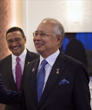 Photograph of United States Secretary of Defense Chuck Hagel and Malaysian Prime Minister Najib Razak Def Min Hishammuddin Tun Hussein