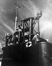 Photograph of Commander David White a top USS Cero's conning tower