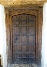 Tudor period main entrance wooden panelled door