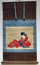 Hanging scroll titled 'Beauty with a cat' by Joran