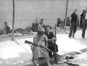 republicans women with rifles rest during a lull in the Spanish Civil War.