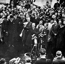 Chamberlain arrives back in Britain after signing of the Munich Agreement