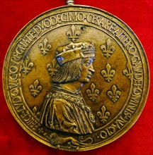 Gilt bronze coin depicting Louis XIII of France