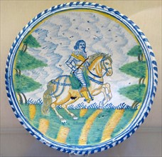 Tin-glazed earthenware dish with equestrian figure