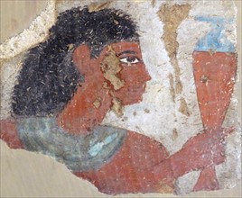 Fragment of painted mud plaster depicting a man holding a jar