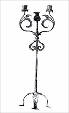 Illustration of a wrought iron candle standard