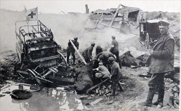 Photograph of Ambulance shattered by the explosion of a shell during World War One