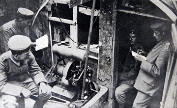 Photograph of Soldiers using wireless telegraphy station near the River Meuse in Belgium