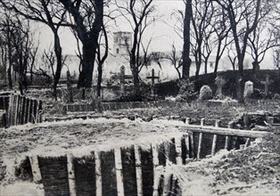 Photograph of a trench near the entrance of a cemetery