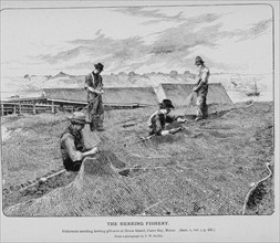 Fishermen mending herring gill-nets at House Island